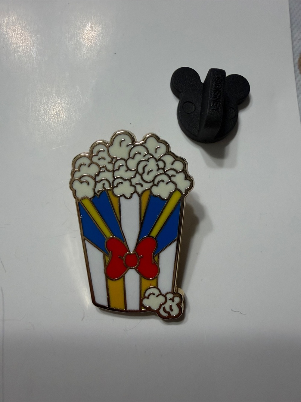 Disney Donald Popcorn Bucket Enamel Pin with Red Bow - White, Blue, Yellow